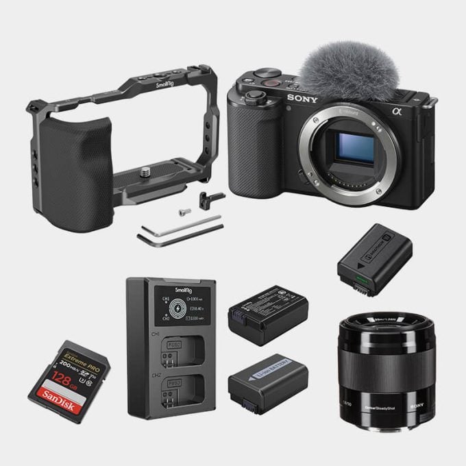 Kit Cámara sin espejo Sony ZV-E10 con Jaula Lente Sony 50 mm f/1.8 OSS, Memoria 64GB y Kit de Cargador con Batería